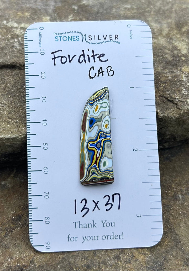 AAA+ Fordite/Detroit Freeform Cabochon 13x37mm - Fordite