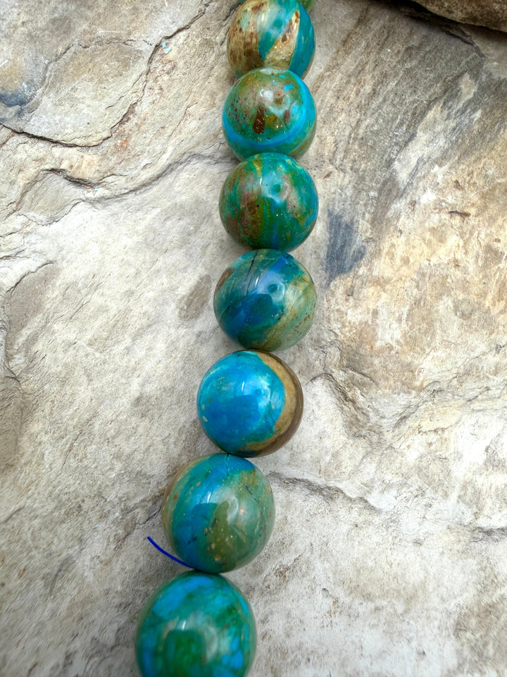 AAA+ Peruvian Blue Opal 11.5mm Round Beads 8 Inch Strand/18