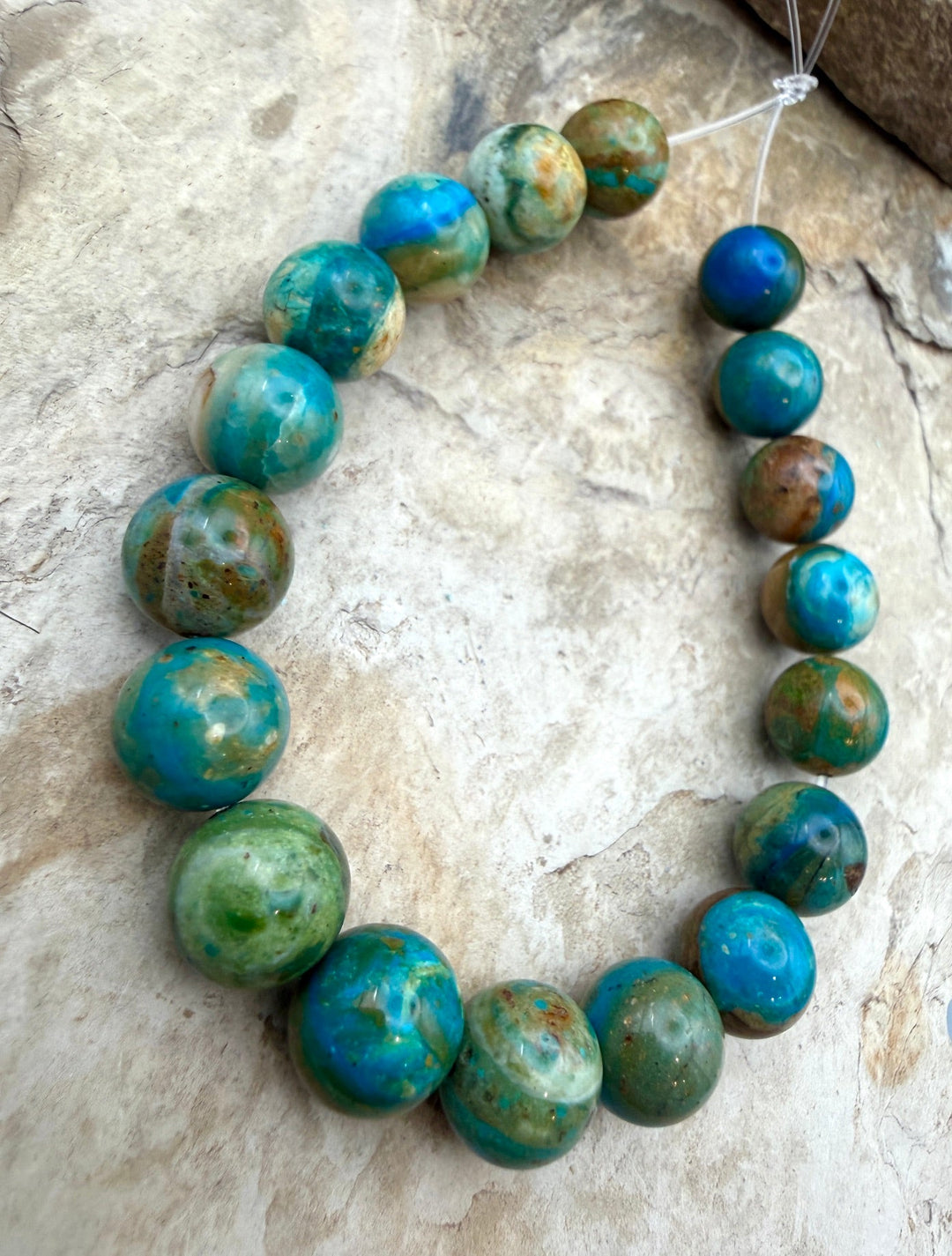 AAA+ Peruvian Blue Opal 11.5-12mm Round Beads 8 Inch