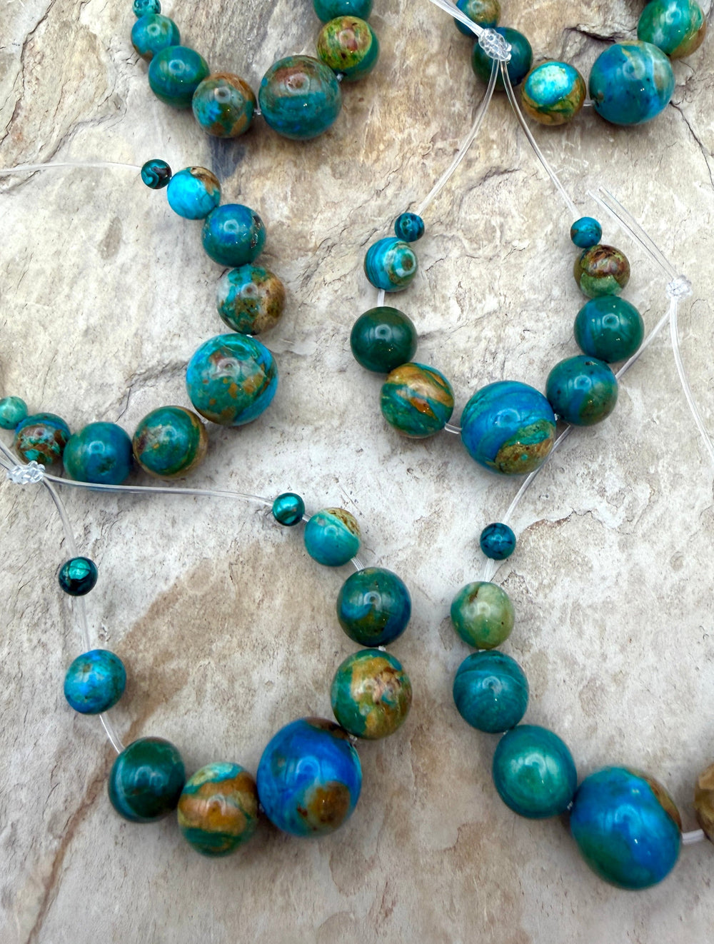 AAA+ Peruvian Blue Opal Graduated Round Bead Focal Strand