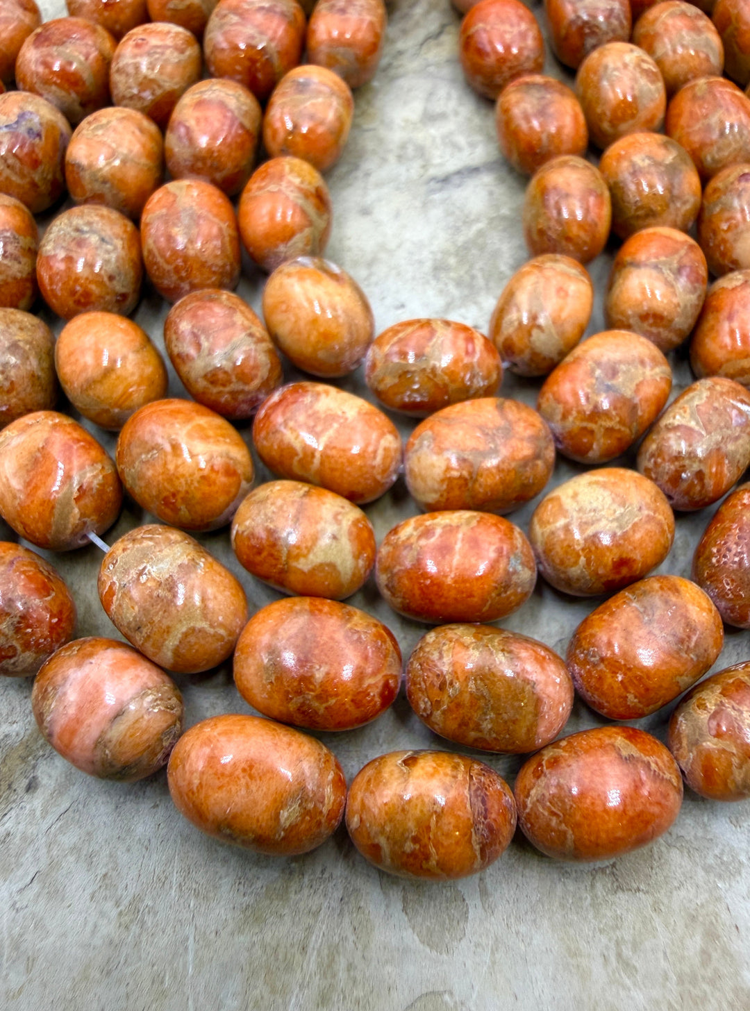Apple Coral Oval Nugget Beads 8x11mm 8 inch Strand/20 Beads