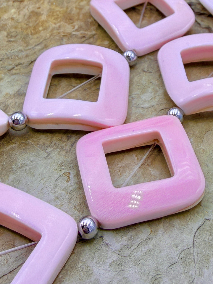 BARGAIN FRIDAY CLOSEOUT Pinck Conch Diamond shapped beads