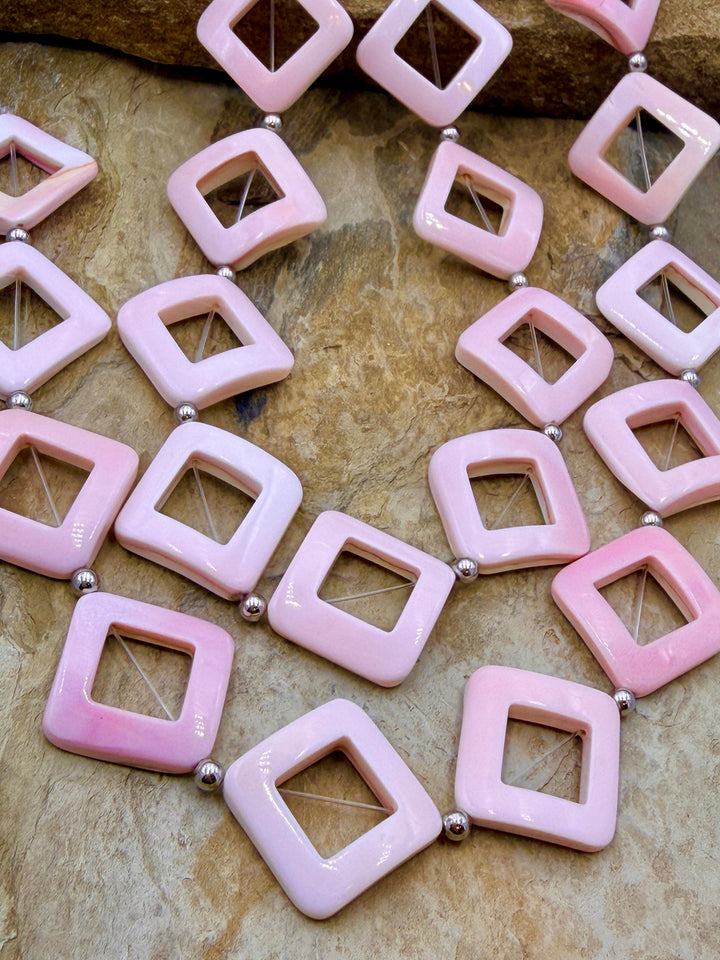 BARGAIN FRIDAY CLOSEOUT Pinck Conch Diamond shapped beads