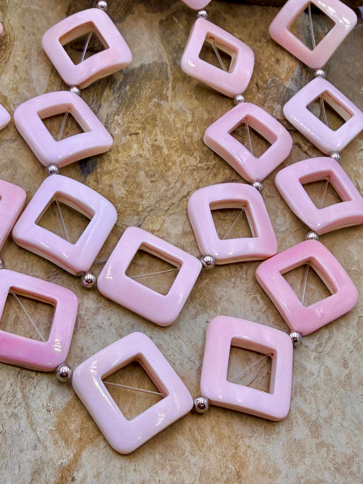 BARGAIN FRIDAY CLOSEOUT Pinck Conch Diamond shapped beads