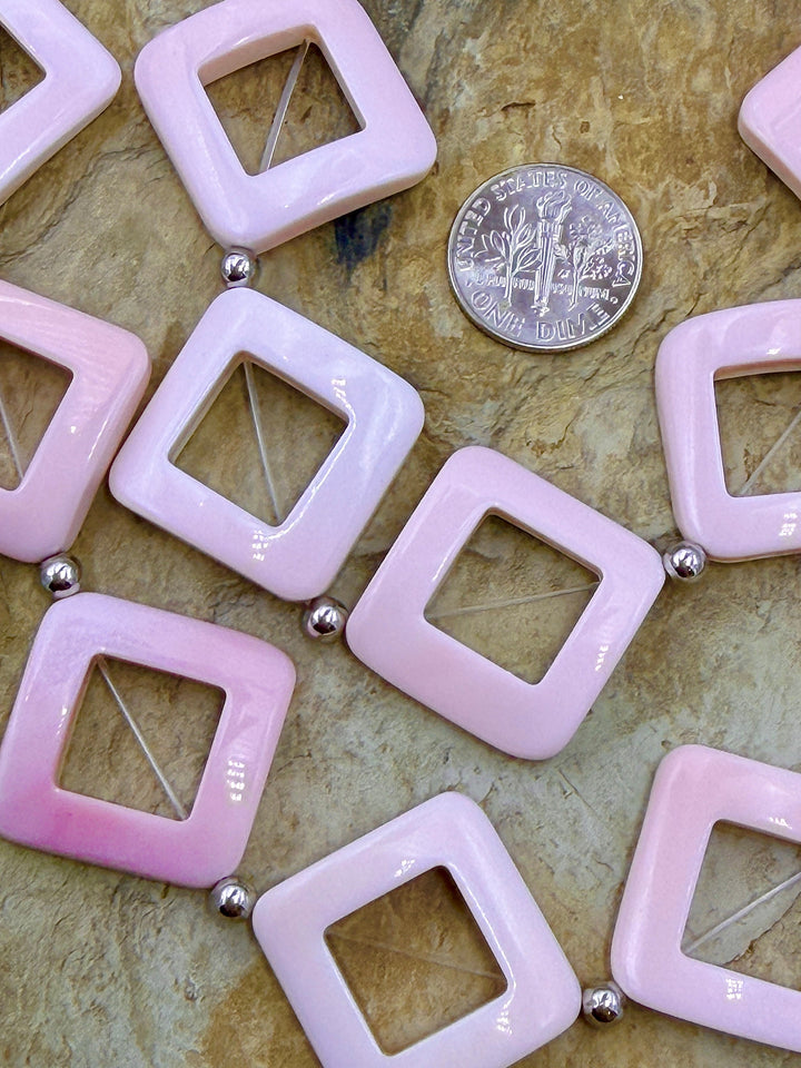 BARGAIN FRIDAY CLOSEOUT Pinck Conch Diamond shapped beads