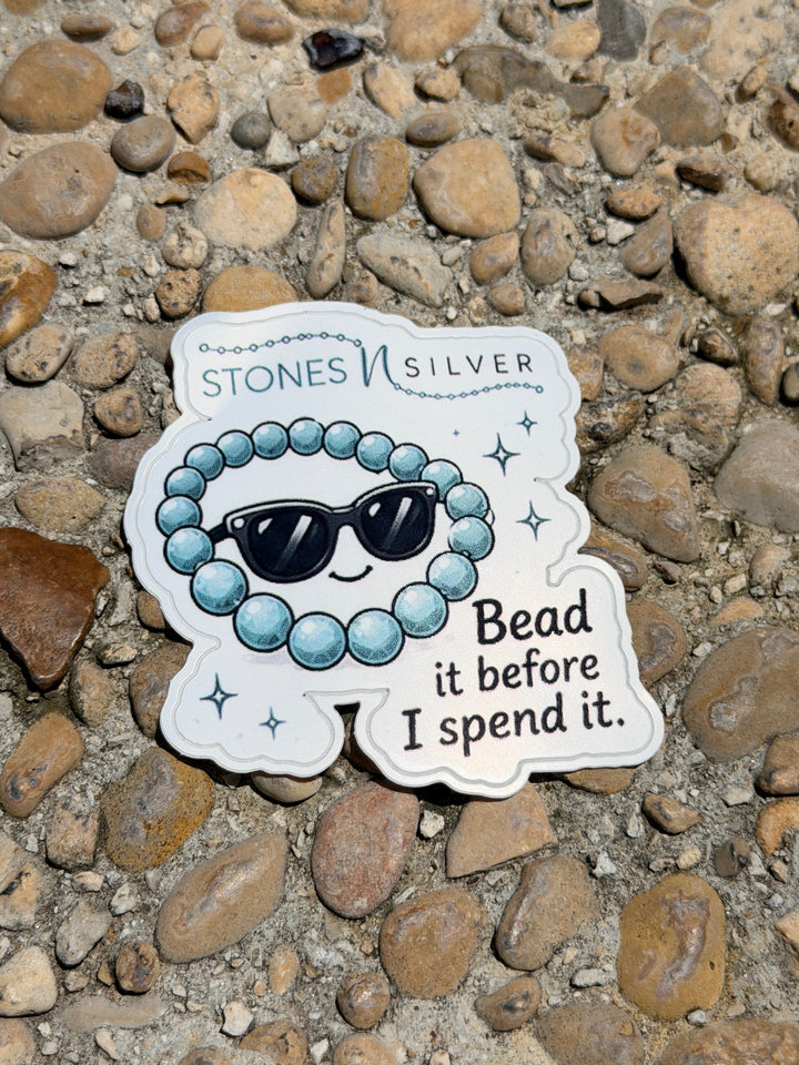 ’Bead it before I spend it.’ Sticker 2.5 inches - merch