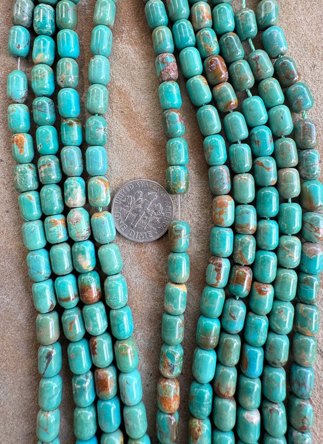 Campitos (Mex) Turquoise 6x8mm Barrel Shaped Beads (8 inch