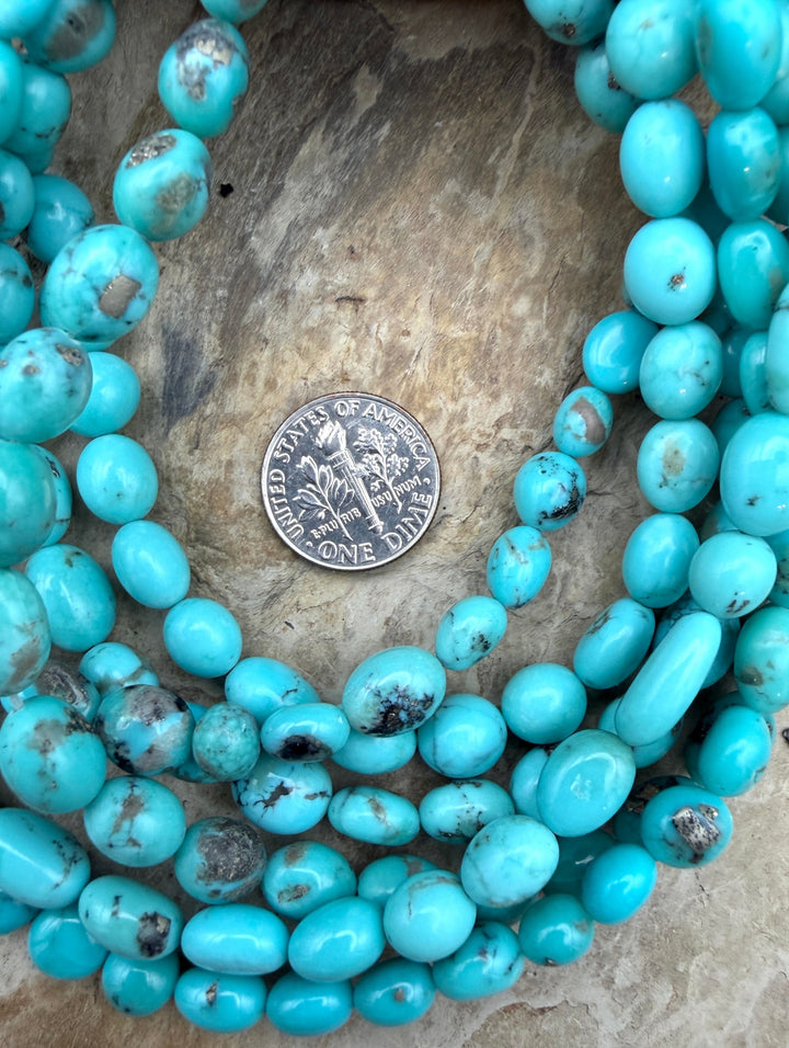 Campitos Turquoise (Mexico) with Pyrite Smooth Oval Nugget
