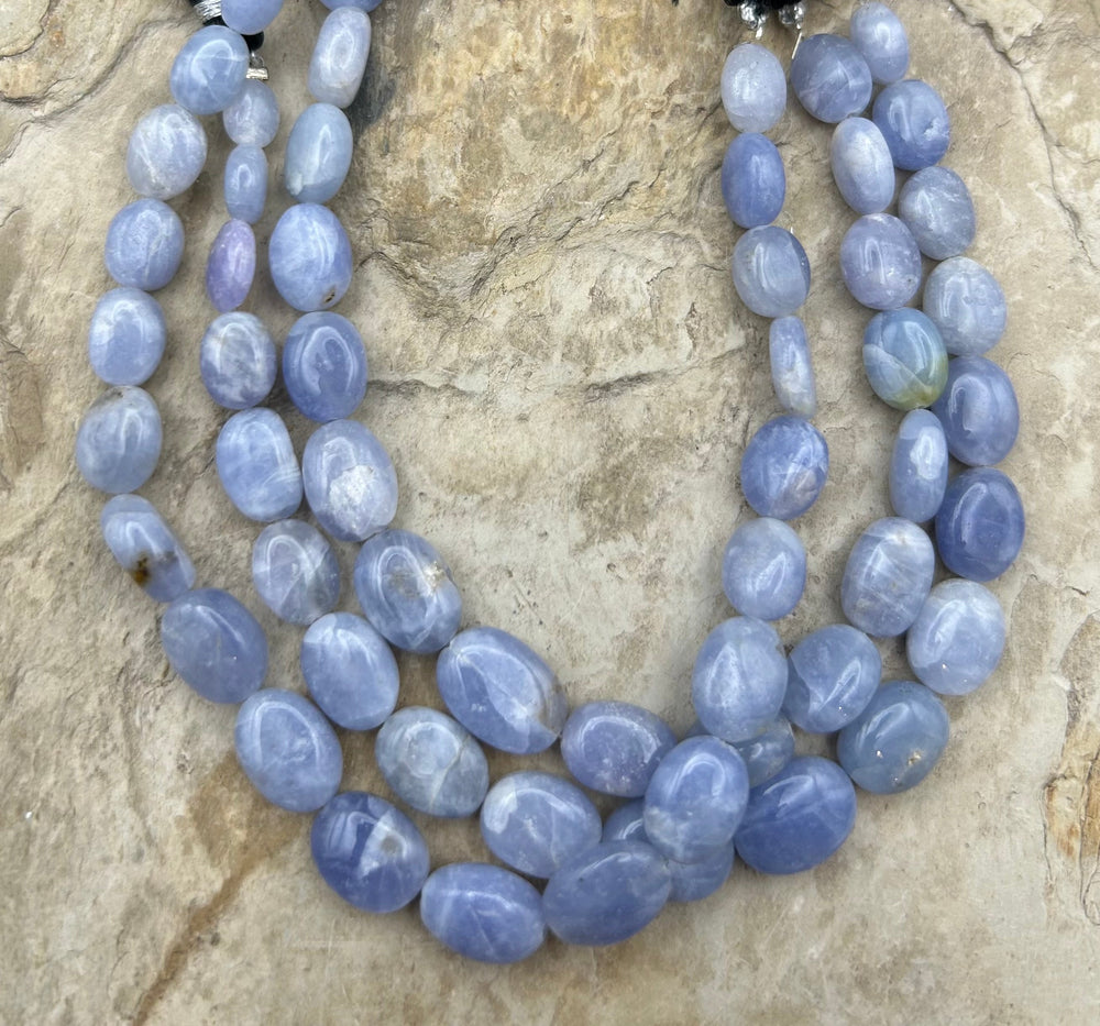 Hackmanite (Afghanistan) Handcut Graduated Oval Beads