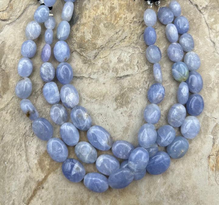 Hackmanite (Afghanistan) Handcut Graduated Oval Beads