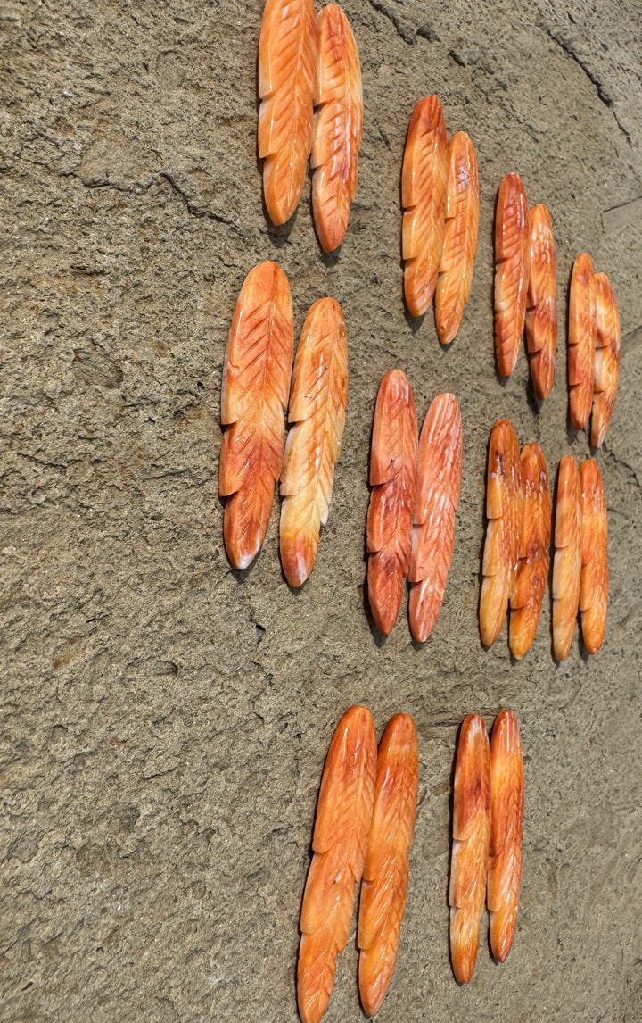 High Quality Orange Spiny Oyster Carved Feather Bead Pair