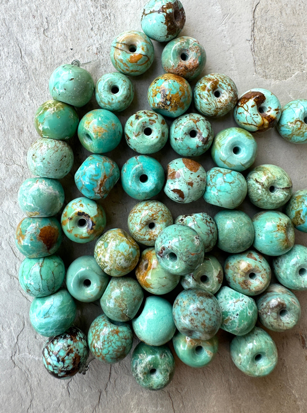 Hubei Turquoise (China) 10x8mm Drum Shaped Beads (Package