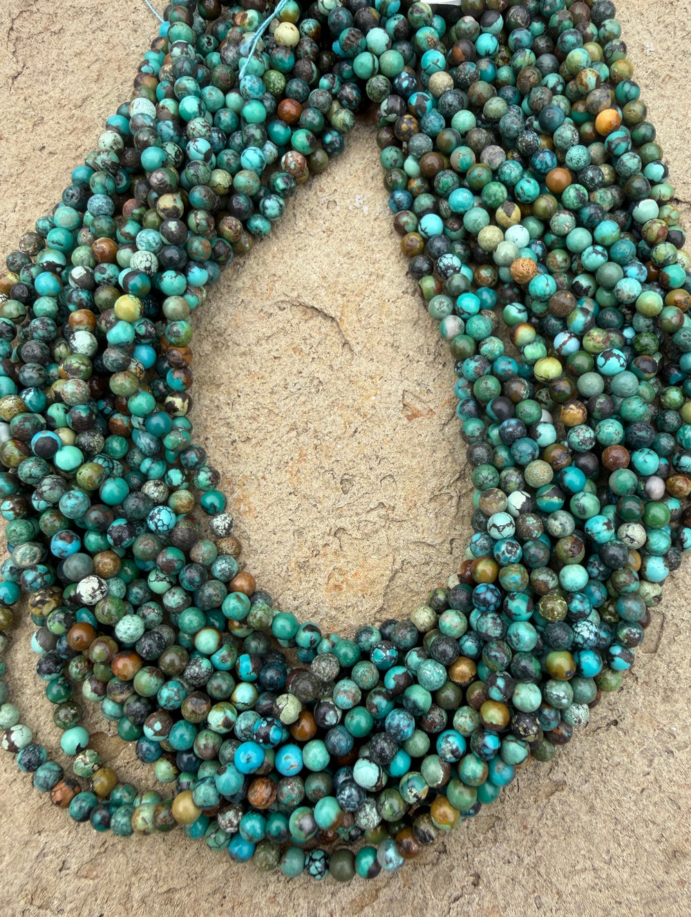 Hubei Turquoise (China) 4mm Round Beads 15 Inch Strand