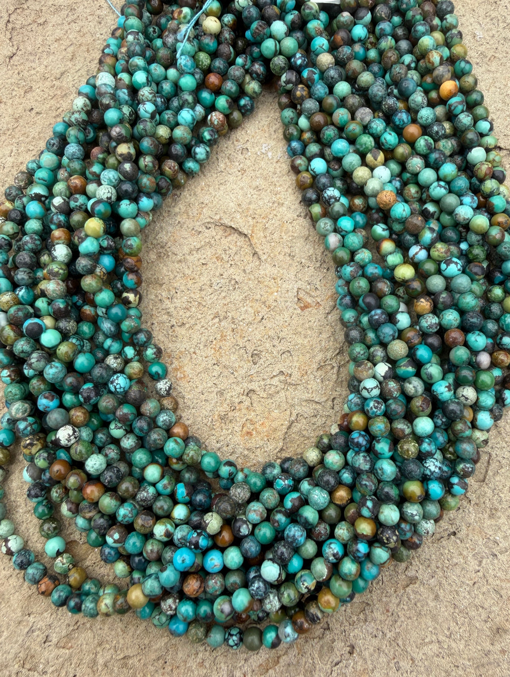 Hubei Turquoise (China) 4mm Round Beads 15 Inch Strand