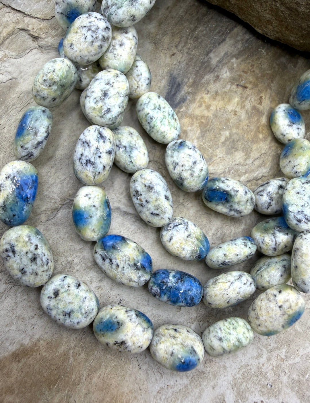 K2 Blue Jasper (Pakistan) Oval Beads 8x10-8x12mm 13 Inch