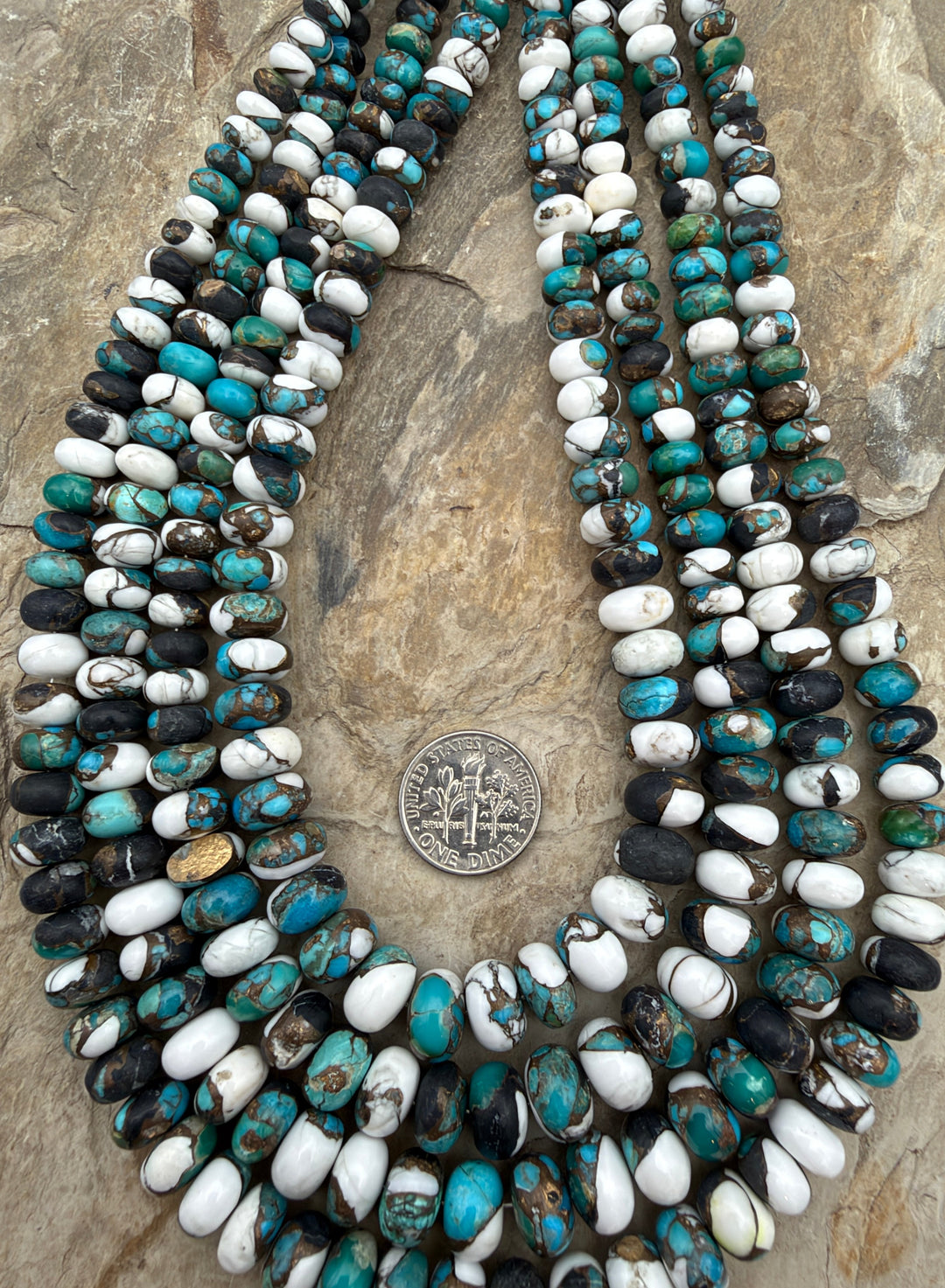 Kingman Turquoise and White Buffalo with Bronze Composite