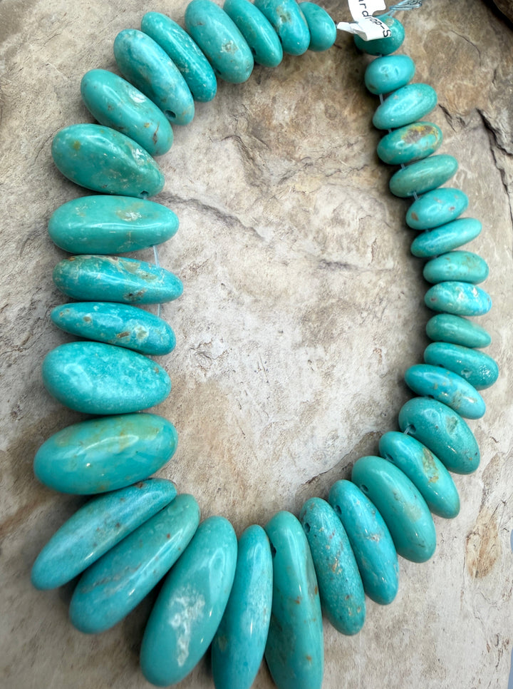 Kingman Turquoise (Arizona) Graduated Long Teardrop Nugget