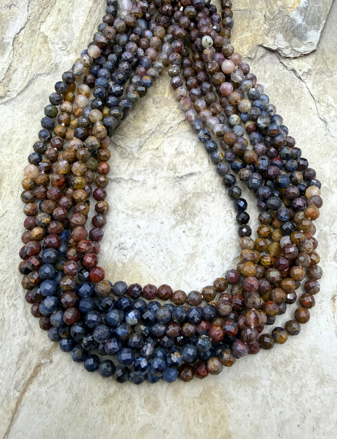 RARE Multi-Colored Pietersite (Namibia) 4mm Faceted Round