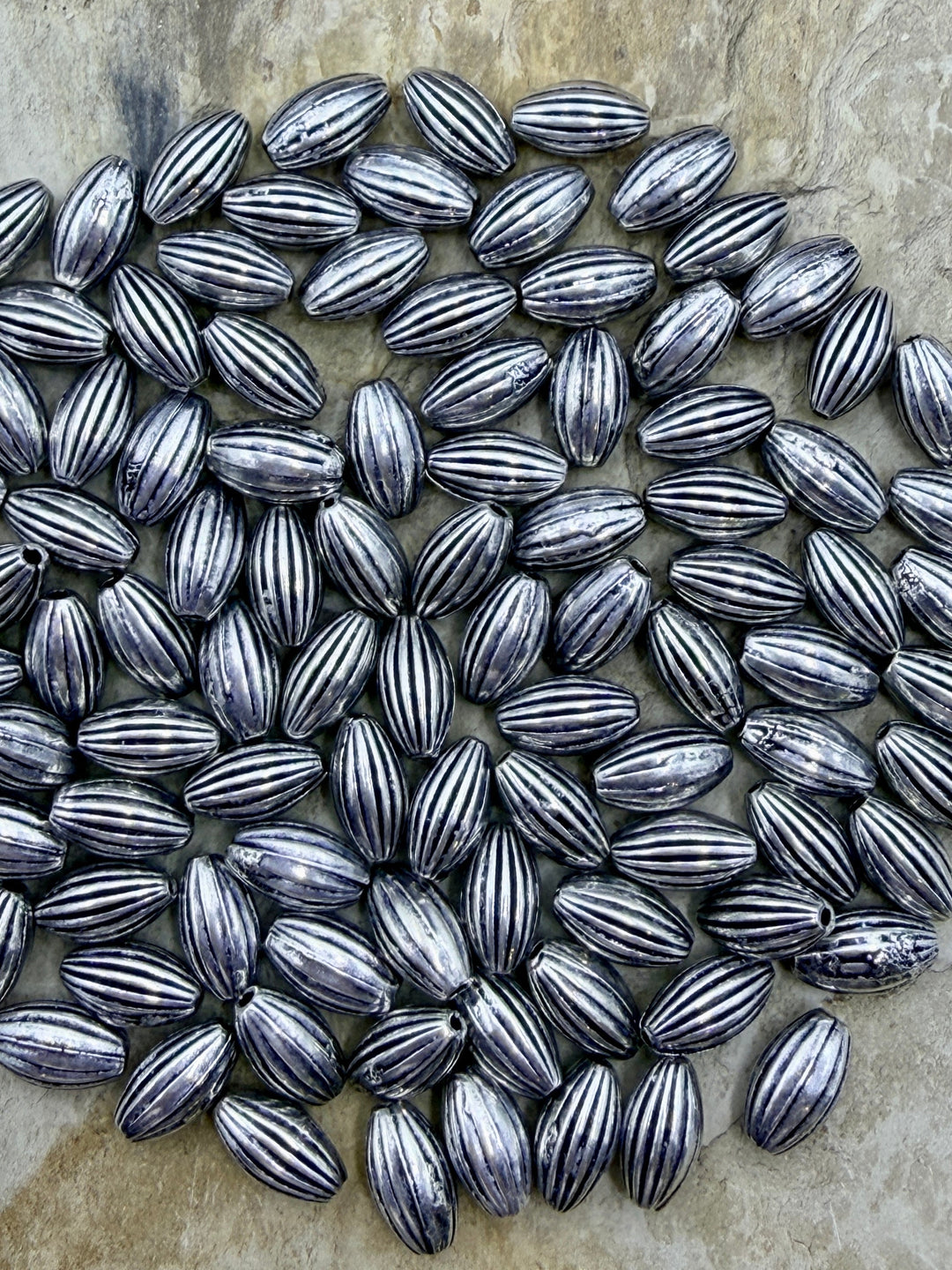 Sterling Silver Oxidized Serrated Rice Beads 5x9mm Package