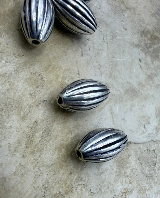 Sterling Silver Oxidized Serrated Rice Beads 5x9mm Package