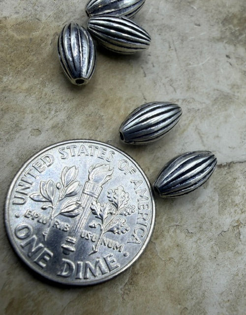 Sterling Silver Oxidized Serrated Rice Beads 5x9mm Package