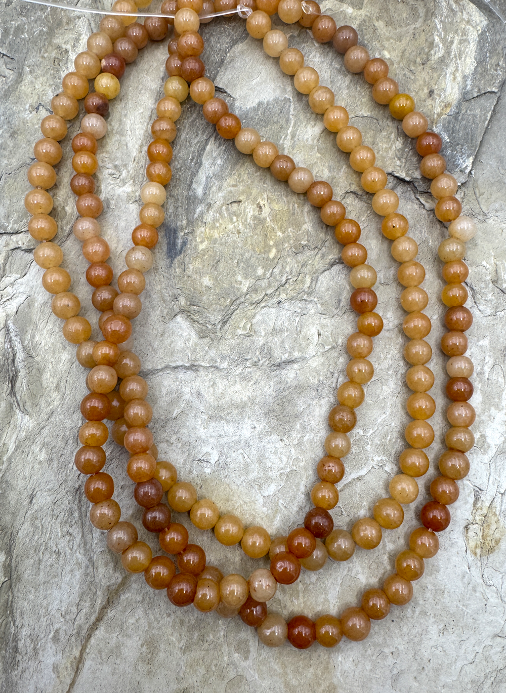 Sunstone (Canada) 7mm Round Beads 15.5 Inch Strand