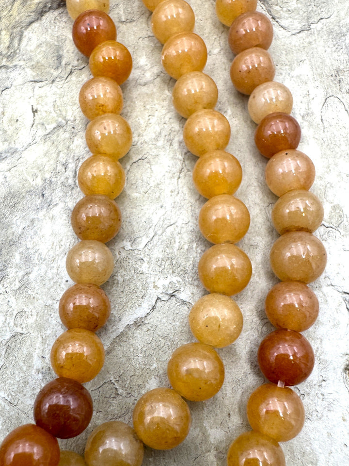 Sunstone (Canada) 7mm Round Beads 15.5 Inch Strand Sunstone