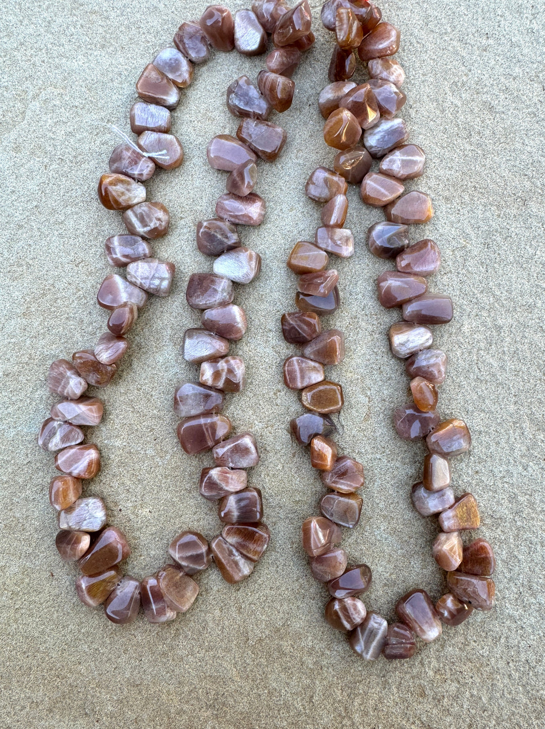 Sunstone Irregular Tabs Beads 10x13mm 16 inch Strand