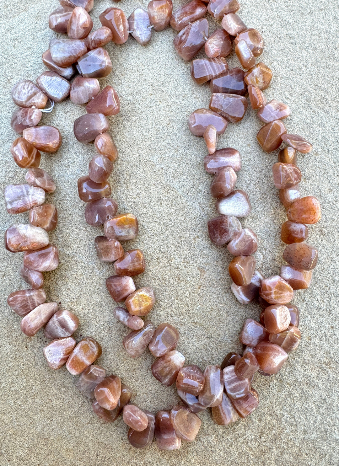 Sunstone Irregular Tabs Beads 10x13mm 16 inch Strand